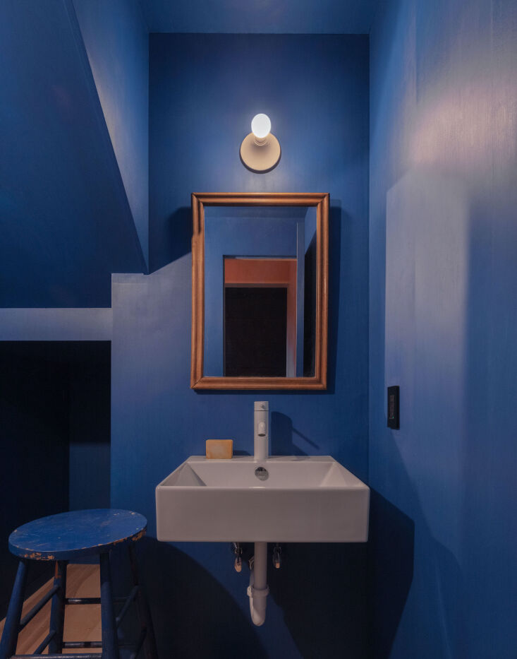 the plywood walls here were stained in a semi sheer yves klein blue like color  18