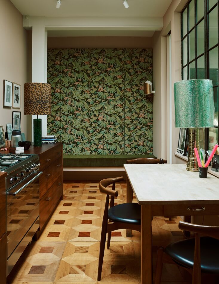 the patterned back wall is vintage tropical curtain fabric applied to panels to 19
