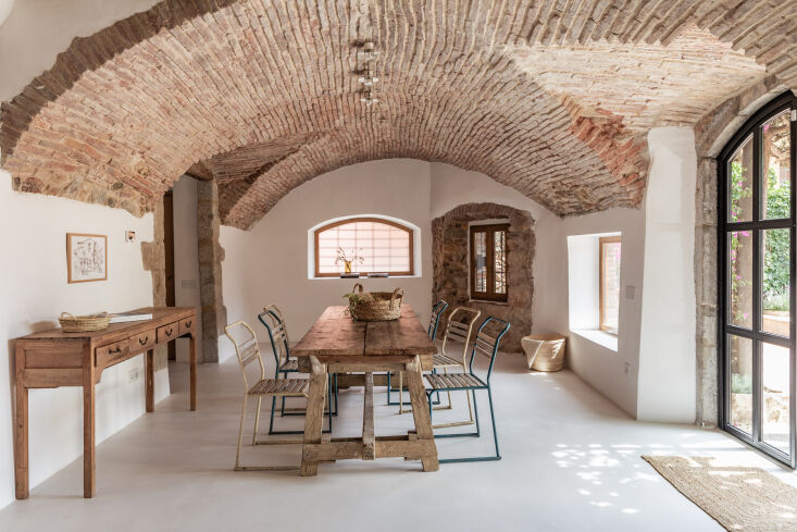 the house is an old traditional farmhouse on mallorca, a holiday escape for the 12