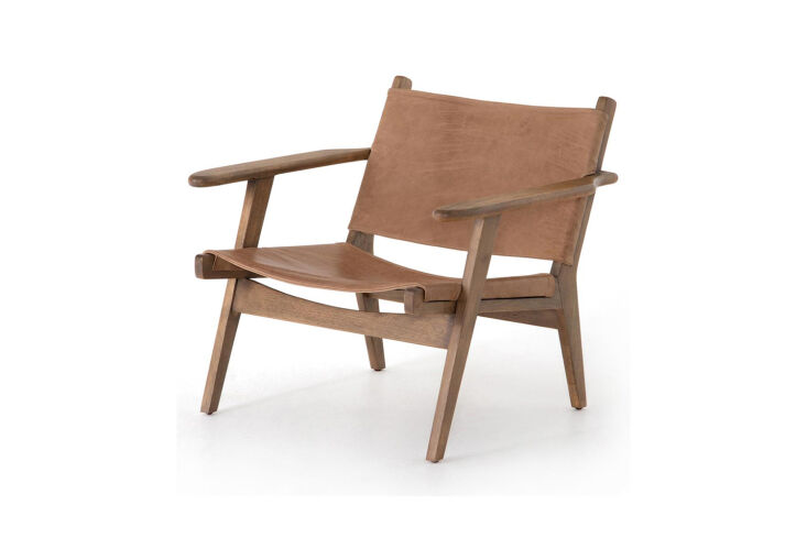 the luis rustic lodge brown leather sling armchair is \$\1,\299 at kathy kuo ho 19