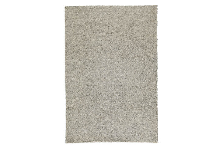 the room & board arden area rug shown in ivory/grey is \$\1,799. 15