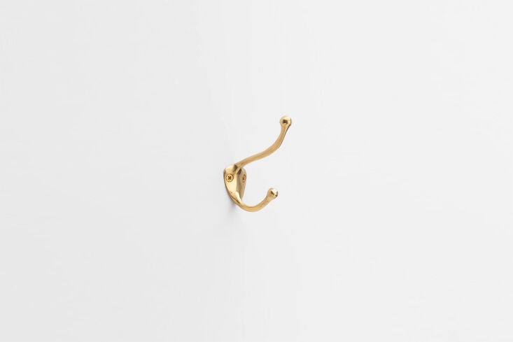 the schoolhouse dover coat + hat hook in polished brass is \$\29. 22