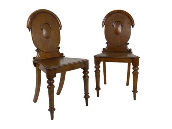 pair of oak shield back chairs 16