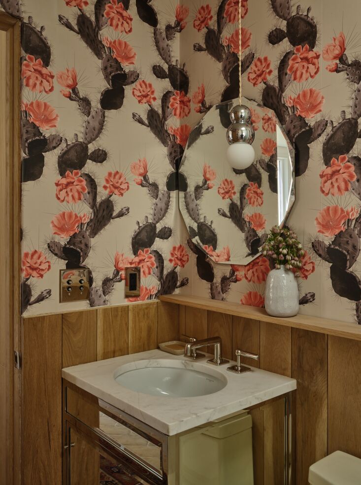 the compact bath is wallpapered in milton & king&#8\2\17;s cactus patte 18