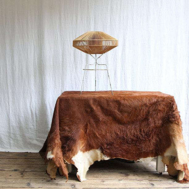 DIY:CowhideasTableCovering-Remodelista