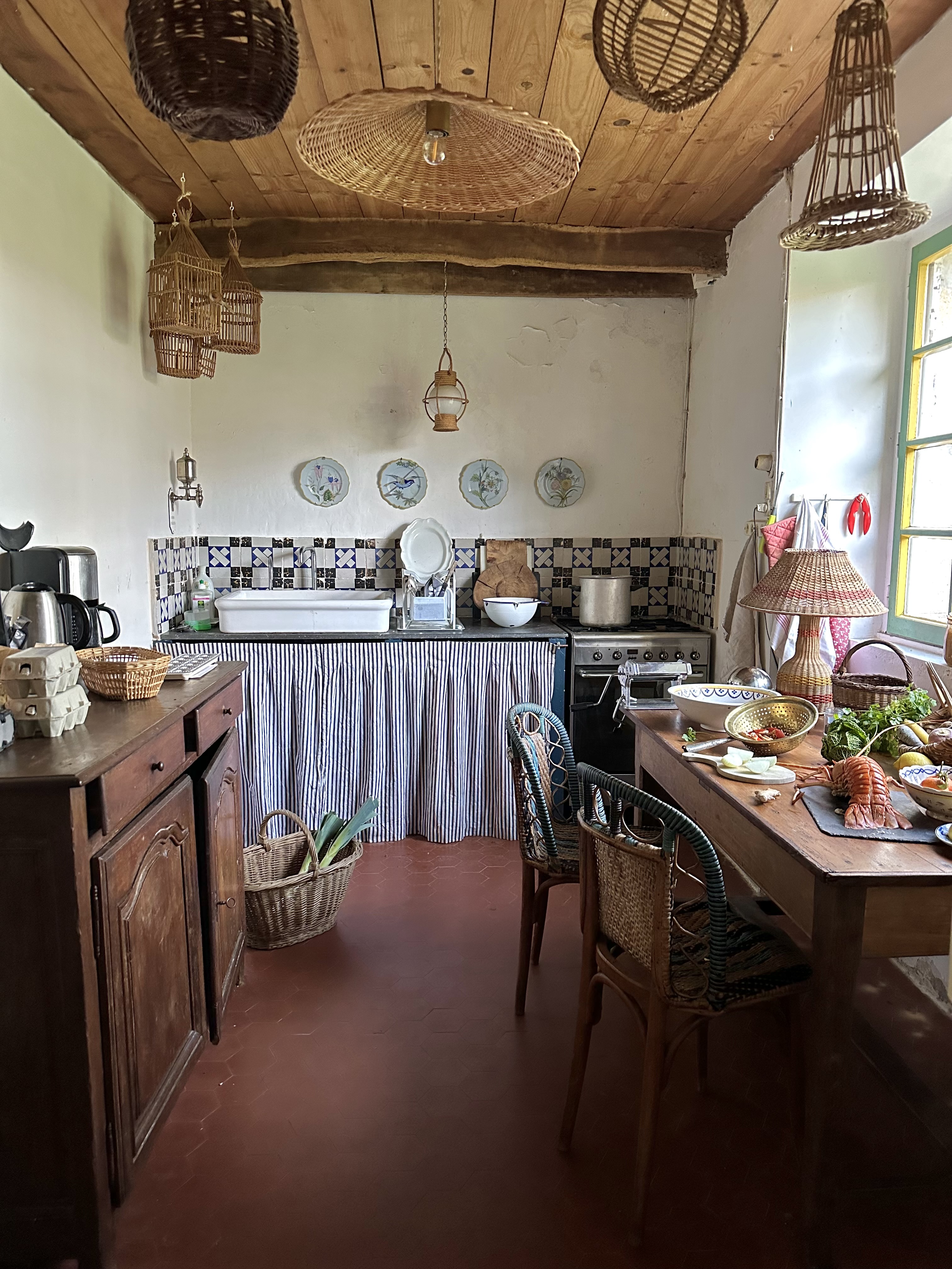 the kitchen retains its \1960s tiled floor and rustic buffet and table. beno&#x 21
