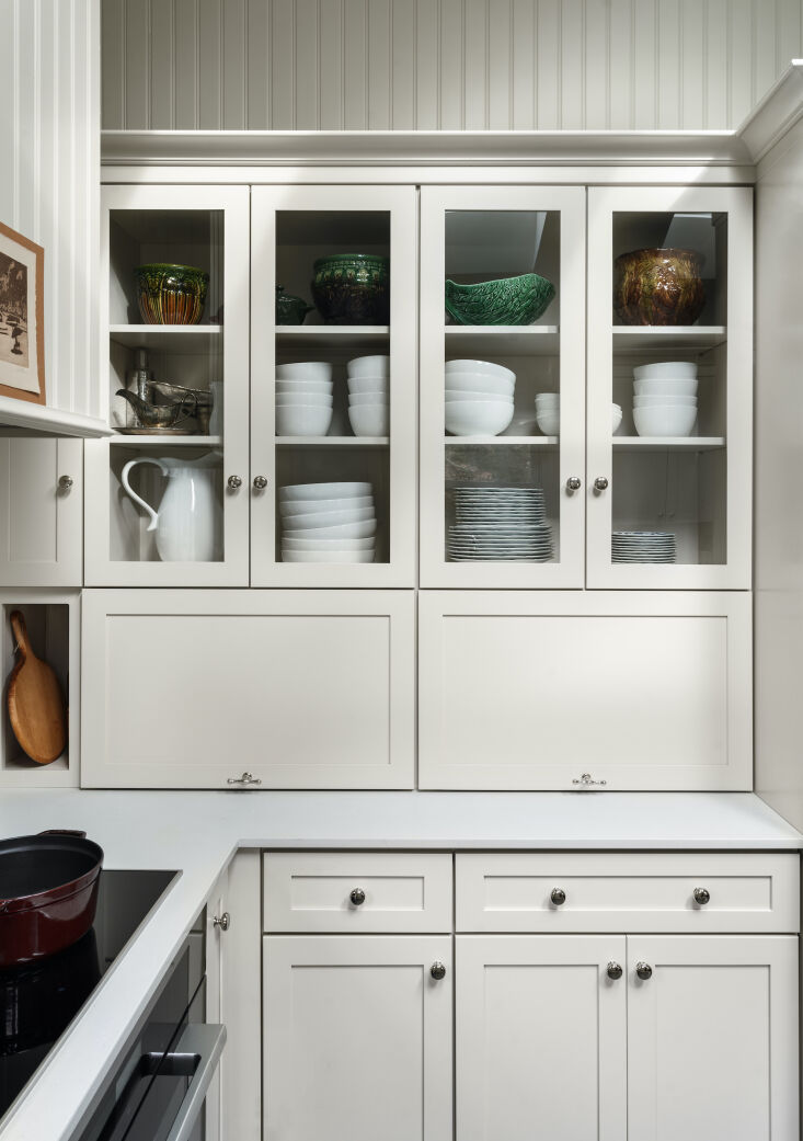every inch of the compact kitchen was designed with storage in mind. this hardw 15