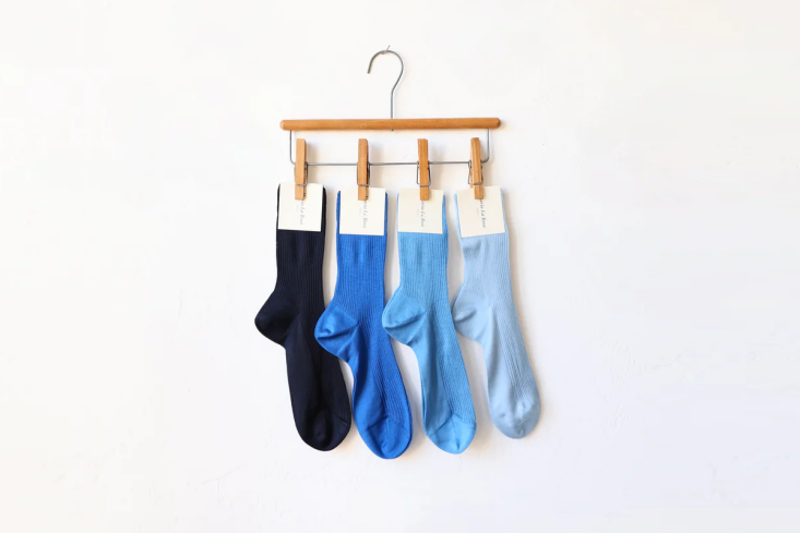 the maria la rosa silk socks are available in four different shades of blue; \$ 20