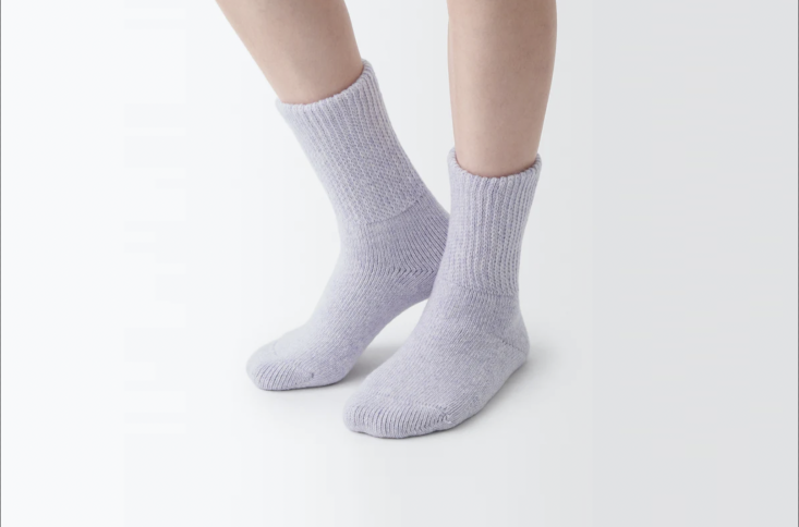 from muji: the loose top yak wool blend cozy socks in lavender, currently on sa 21