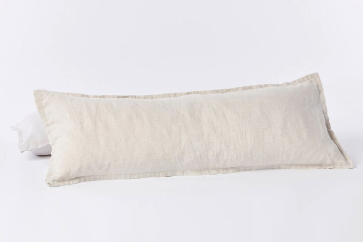 the organic relaxed linen lumbar pillow cover is shown in natural chambray; \$8 27