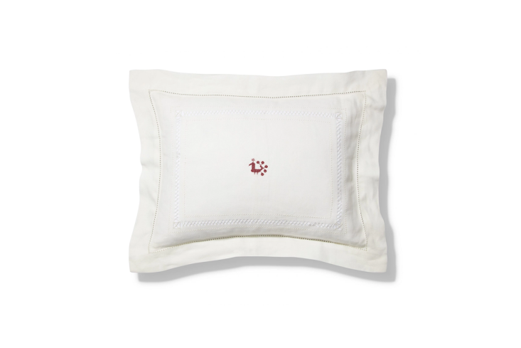 the small diamond stitch pillow is woven from \100 percent linen, feather inner 19
