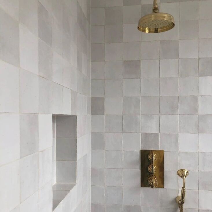 the wall mounted hand shower, from \$464. photo by @marbleandash via francone b 21