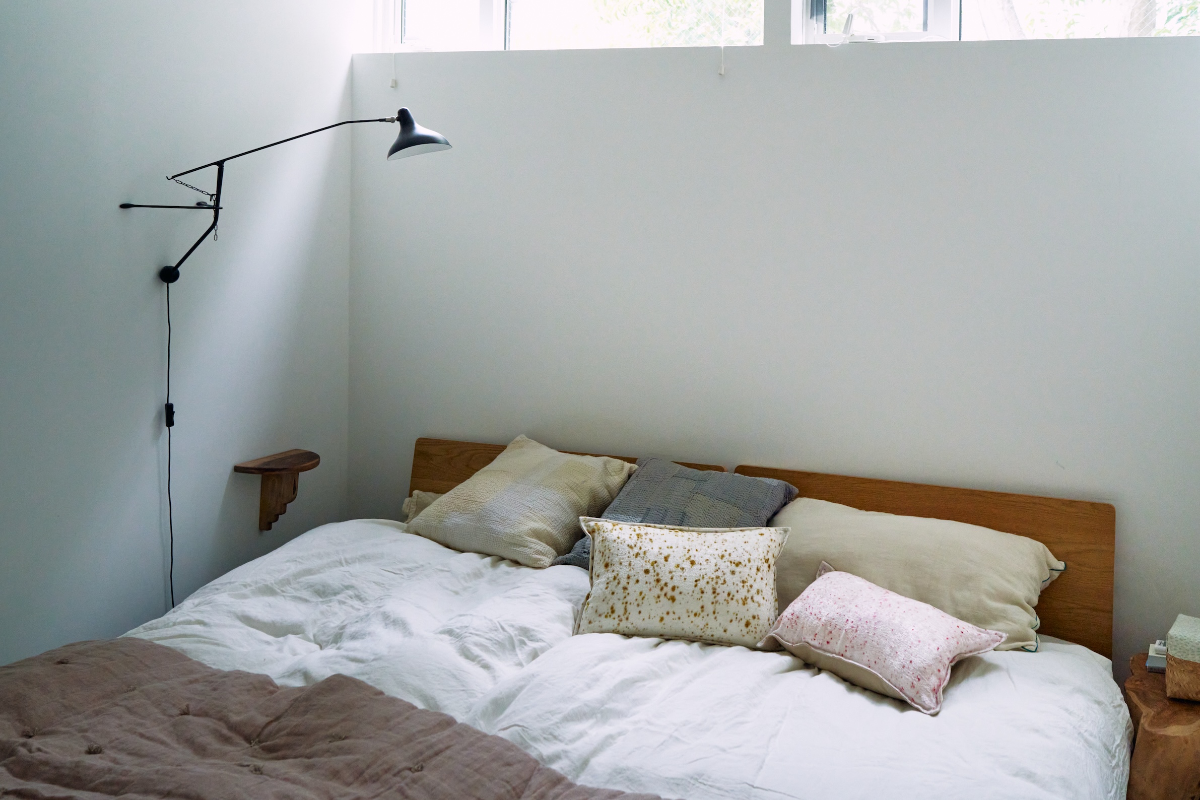 the couple&#8\2\17;s bed frame is from muji with orné de feuilles& 31