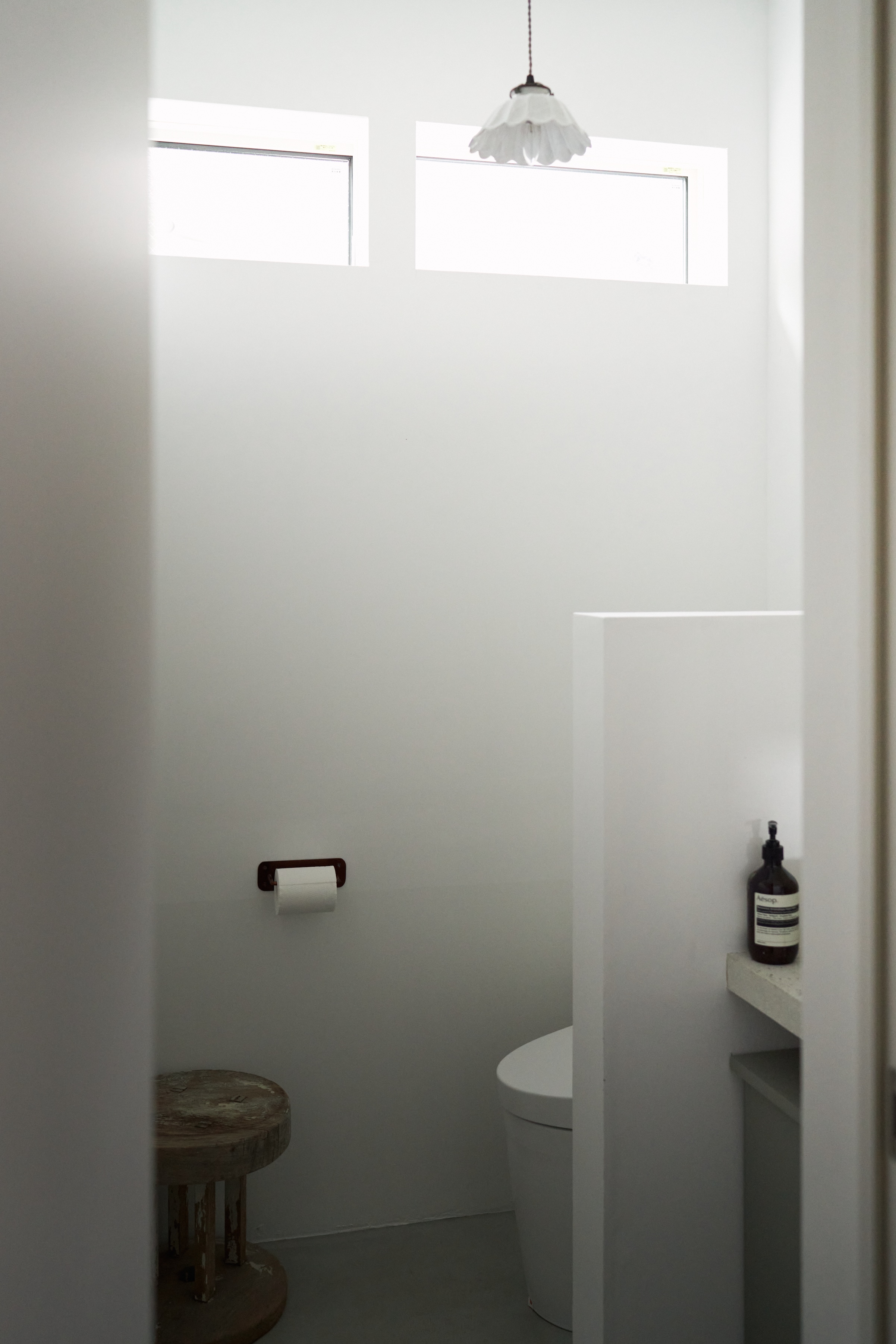 the tall ceilings extend into the bathroom, the window sizes were an ongoing to 29