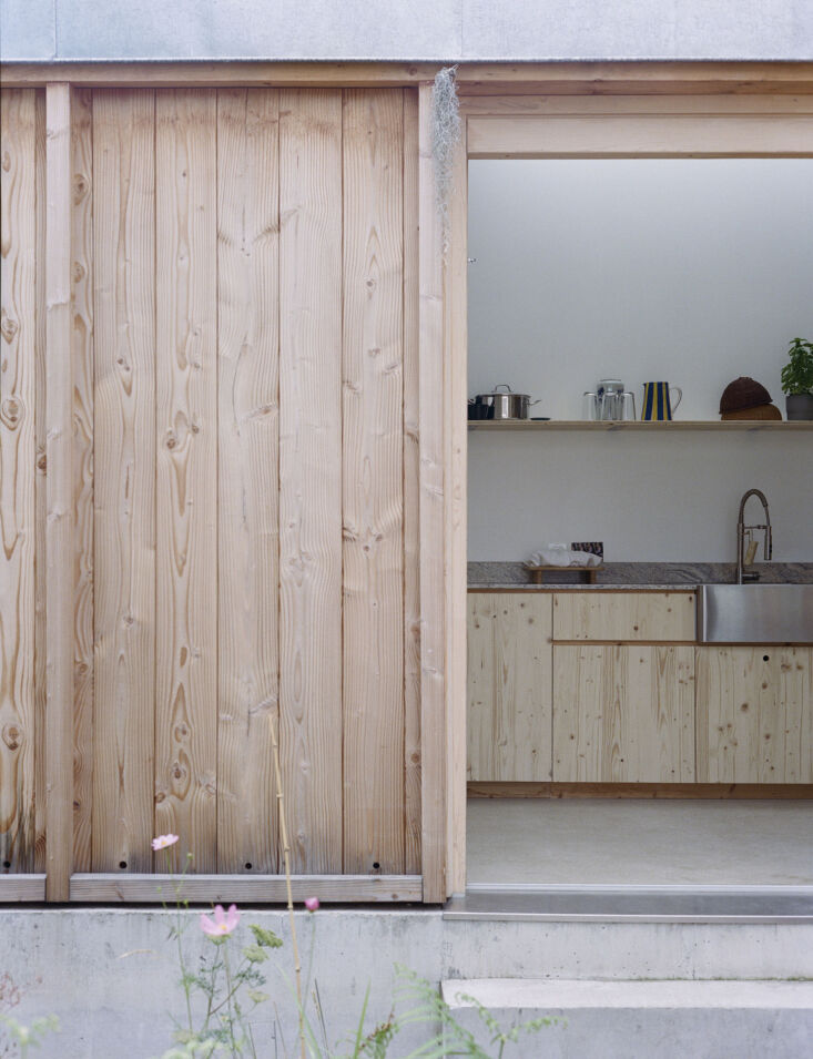 sliding glass doors open into the kitchen. 19