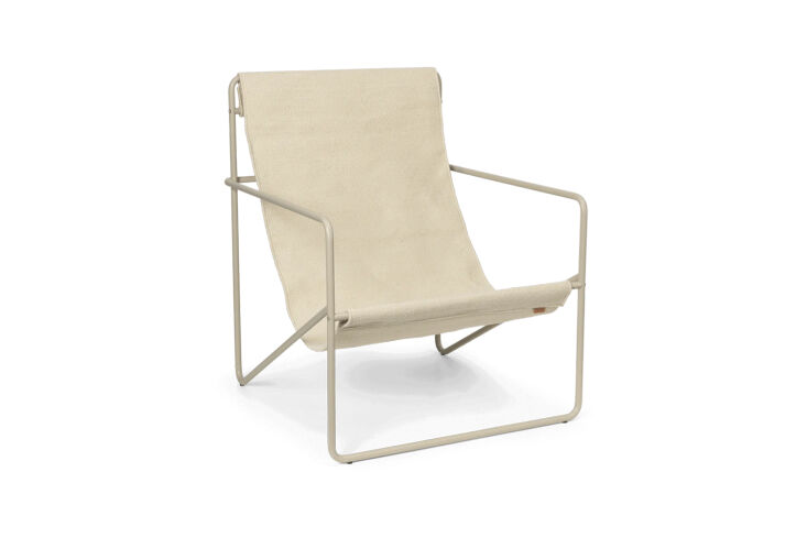ferm living makes the desert lounge chair, shown in cashmere cloud, is \$479. 17