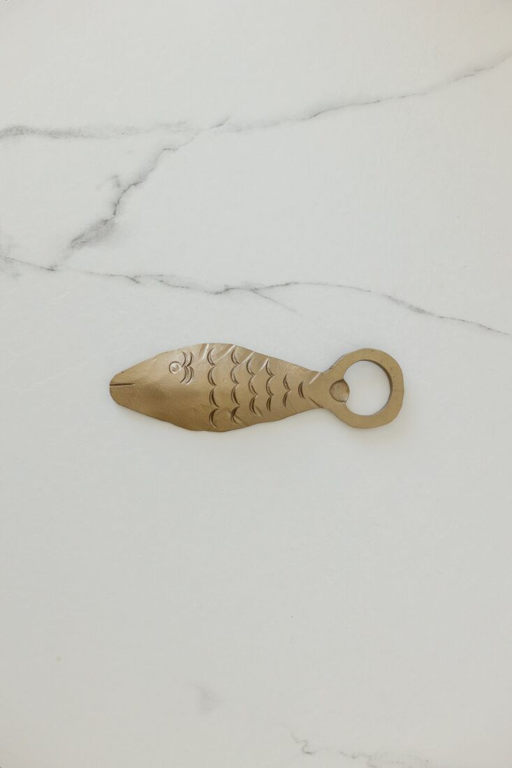 the cast metal fish bottle opener is \$\1\2 from husband and wife run graber co. 25