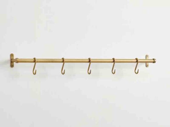 pottery barn brass rail   1 584x438