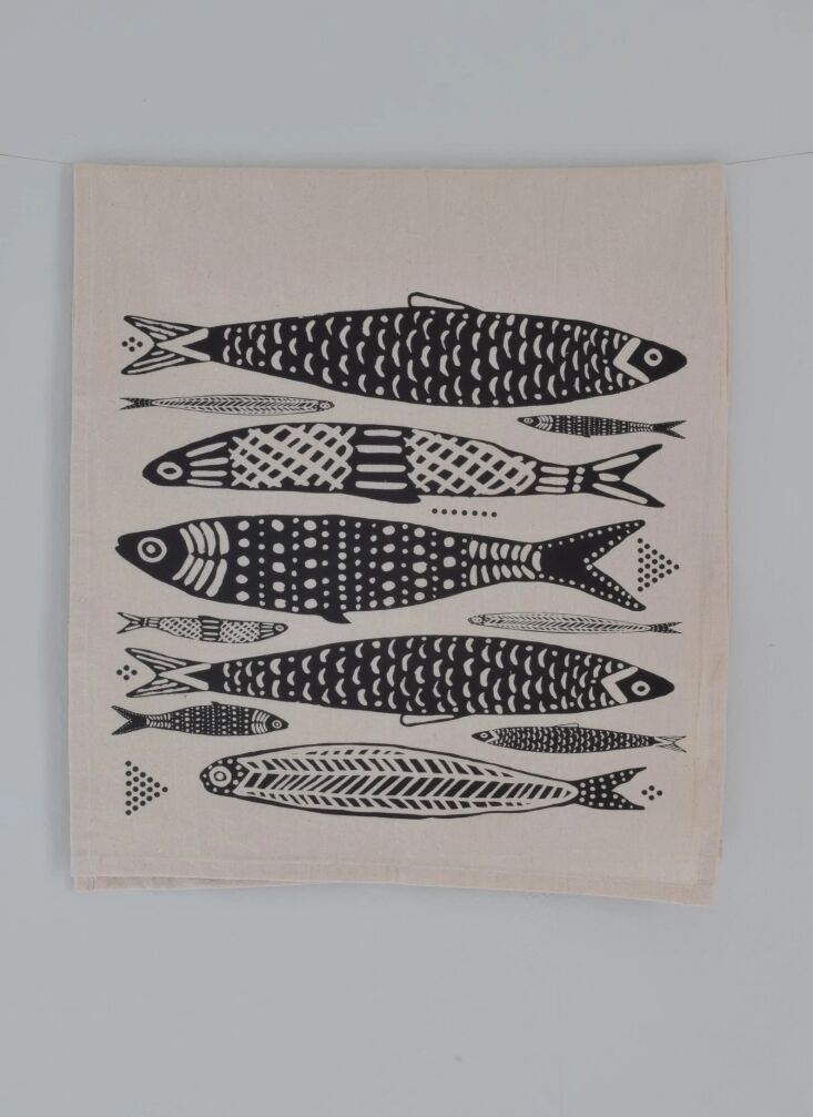 we like this screen printed sardines tea towel from hearth and harrow on etsy;  26