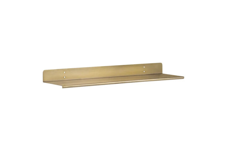 the all modern maja metal floating shelf is \$74 for the gold finish. 25