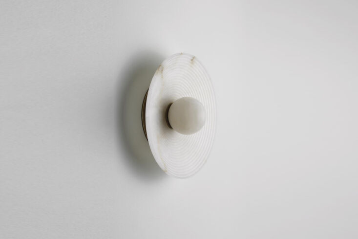 the allied maker concentric \10 inch alabaster sconce is made with a curved ala 19