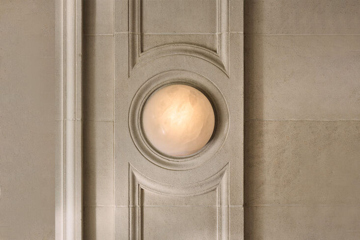 the ollina alabaster indoor/outdoor wall sconce has a half dome shape that can  21