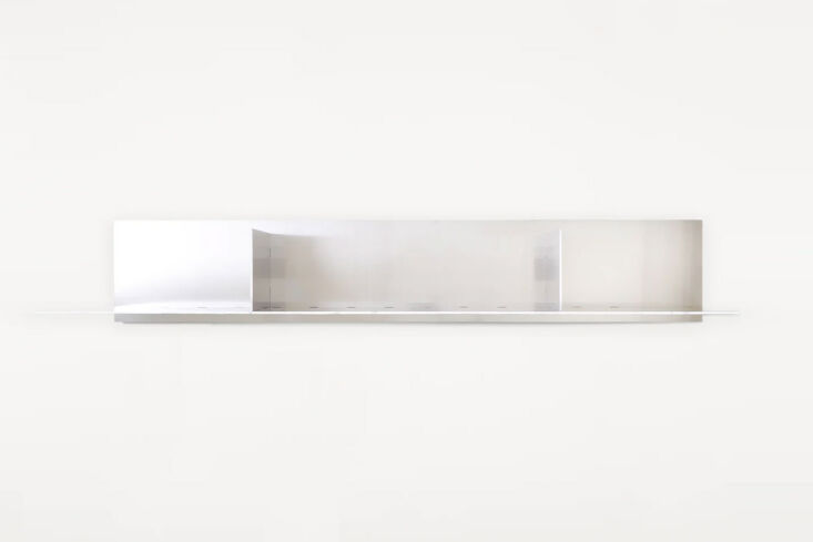 the frama rivet large aluminum shelf is made of laser cut raw aluminum sheets;  22