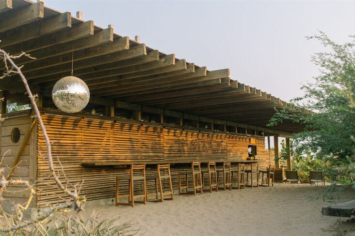 the open air bar and restaurant features sand floors&#8\230; 27