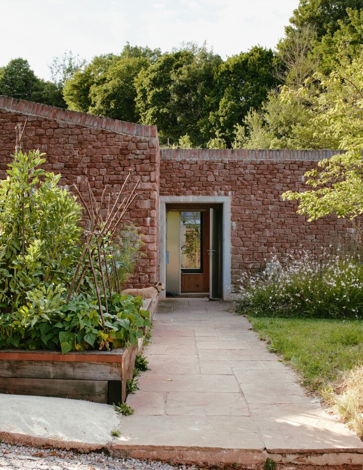 the couple\2\17;s year round kitchen garden flanks a flagstone entry pat 18