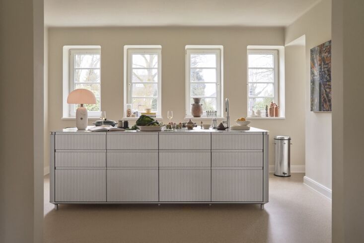 the deep windows were existing but given gently curved frames that match silhou 22