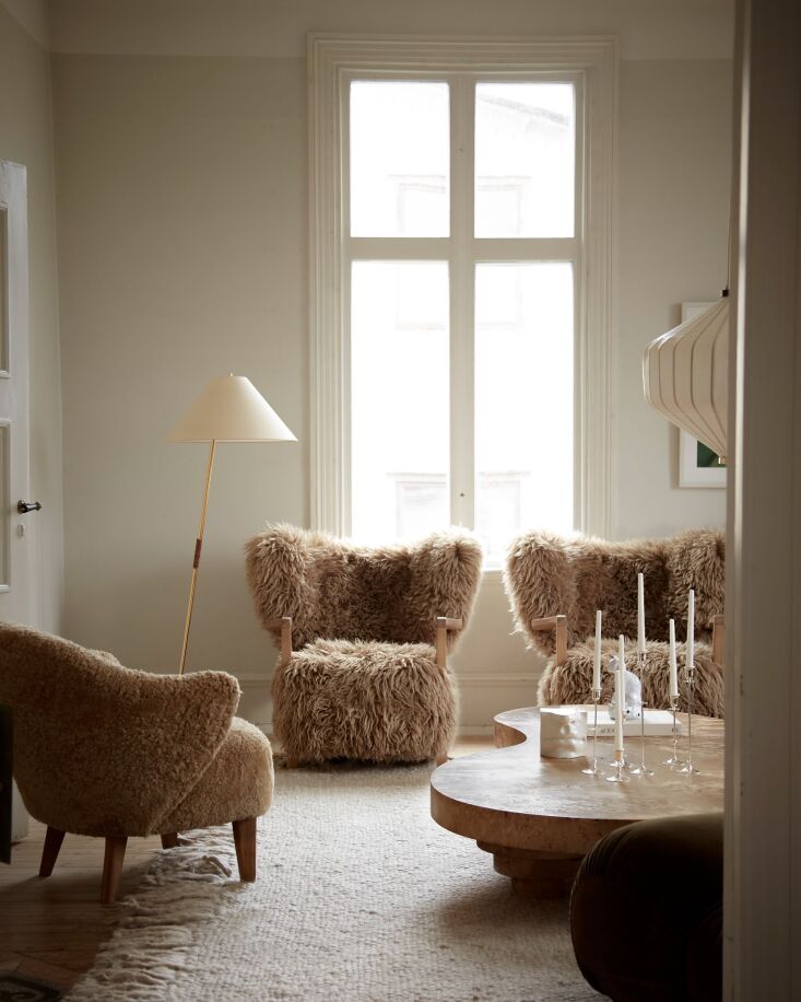sheepskin chairs (from left to right): the ingeborg lounge chair in dark staine 24