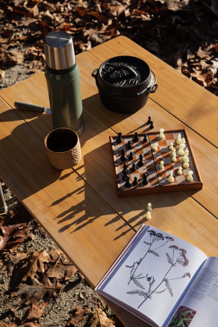 a foldable bamboo table expands the dining options. 24