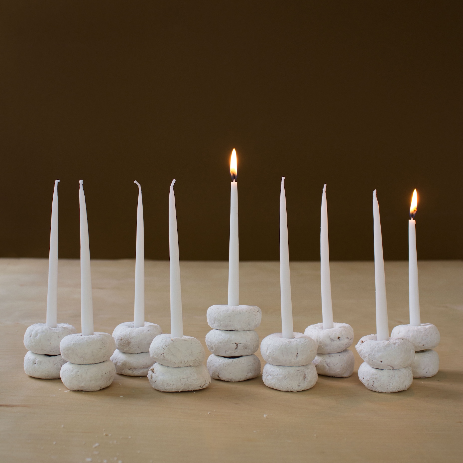 donuts are a hanukkah treat—and can also be put to use as readymade candlehol 20