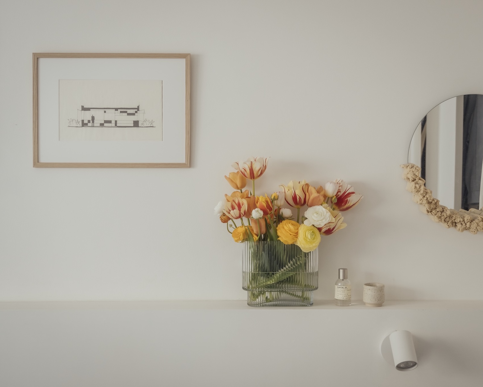 formerly swallowed up by giant mirrored cupboards, the bedroom now has a curtai 26