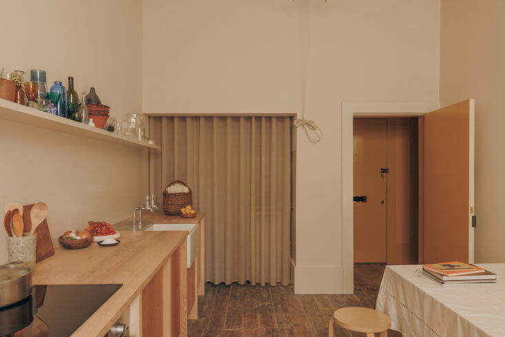 tucked into the concealed alcove, there\2\17;s another countertop, washi 23