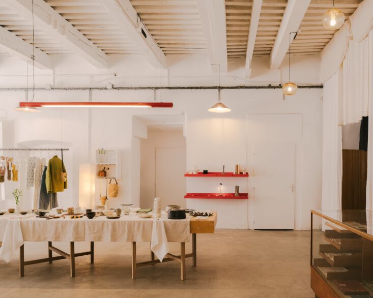 echoing the classic red embroidery thread of her designs, accents in red includ 25