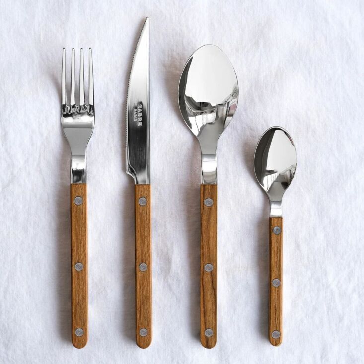 sabre also offers its bistrot flatware with teak handles, a set of four is $84 20