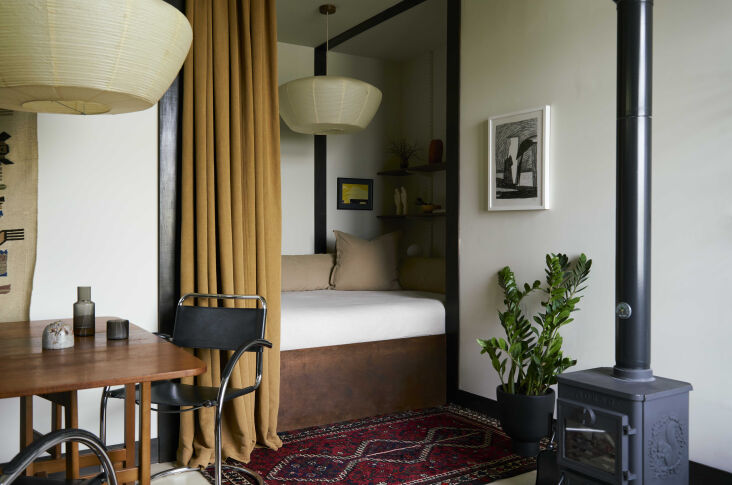 the cozy bed nook used to be the school cupboard; the bathroom was the sluice c 19