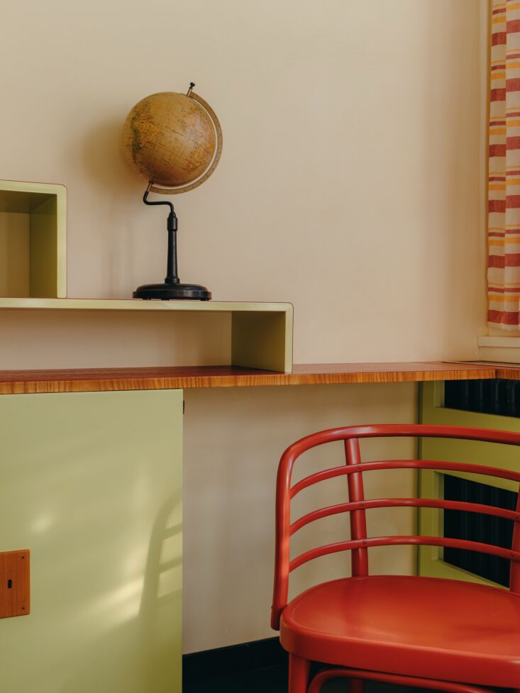 a view of the custom cabinetry and razor thin wood topped detail on the desk ri 24