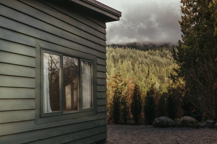 the cabin is at the end of an unmarked dirt road, mountain views included. to b 29