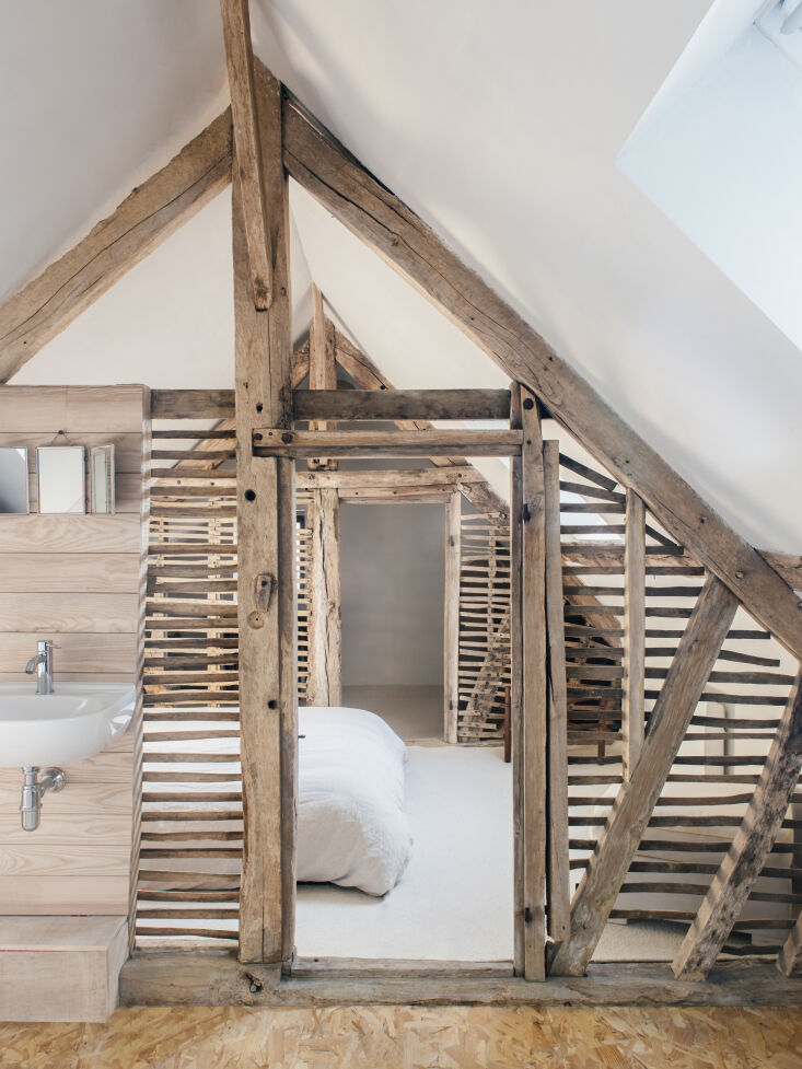 wall partitions were pared back to reveal the original structure. 27