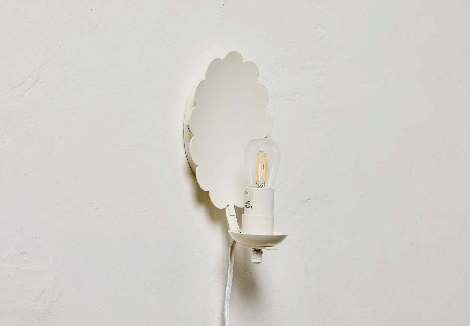 nickey kehoe scallop sconce plug in  