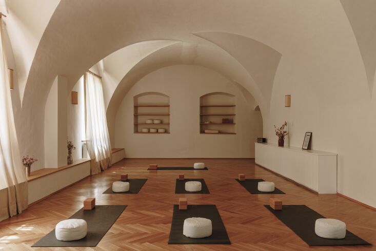 the yoga studio of mention: occupying a vaulted room with dramatic arches and t 26