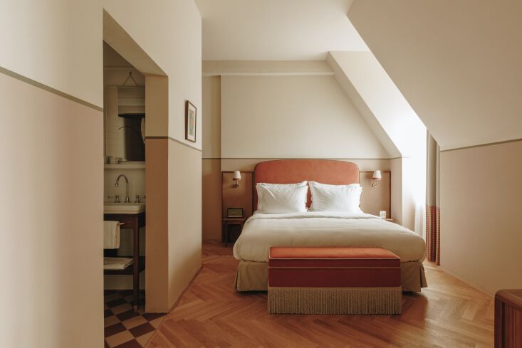 the hotel is made up of 60 rooms and \16 suites. a theme of warm blush stripe a 27