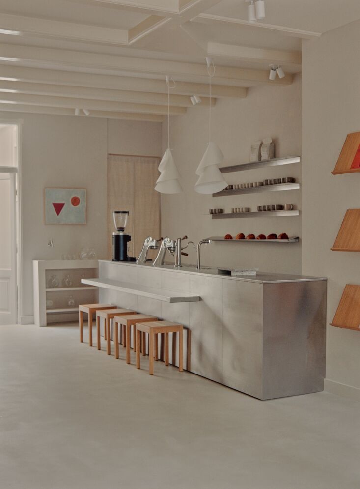 atelier axo designed the brushed stainless steel bar as a \2\20;quiet ar 21