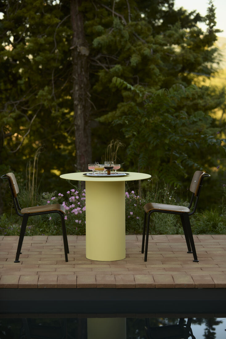 circular tables in pale yellow from ripa design. 31