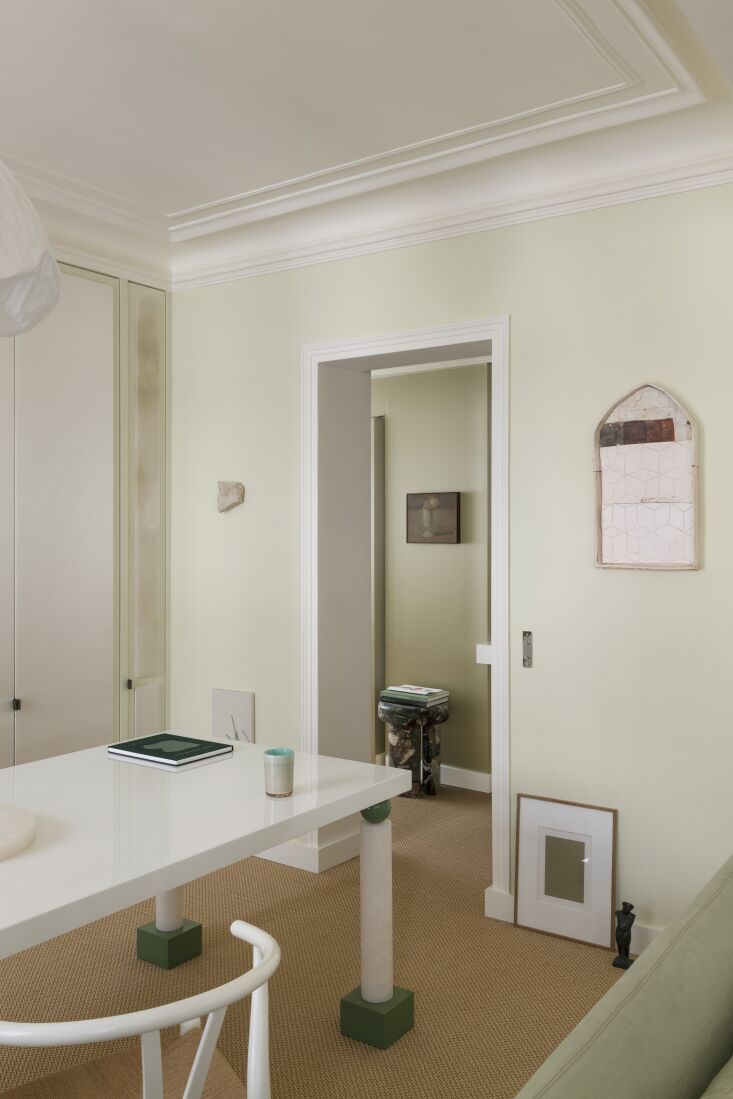 balzano renovated the apartment in full, minus the ceiling in the living room. 24