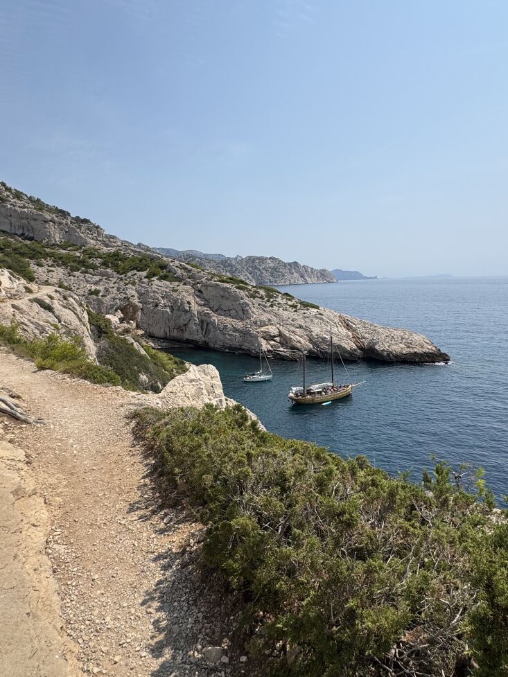 sailboats dot the shoreline along a hike to a remote little calanque (that i wi 34