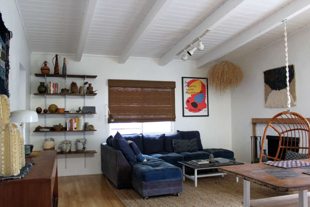 living room with post & beam ceiling 7