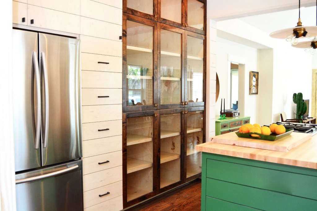 glass front cabinets with pull out pantry 14